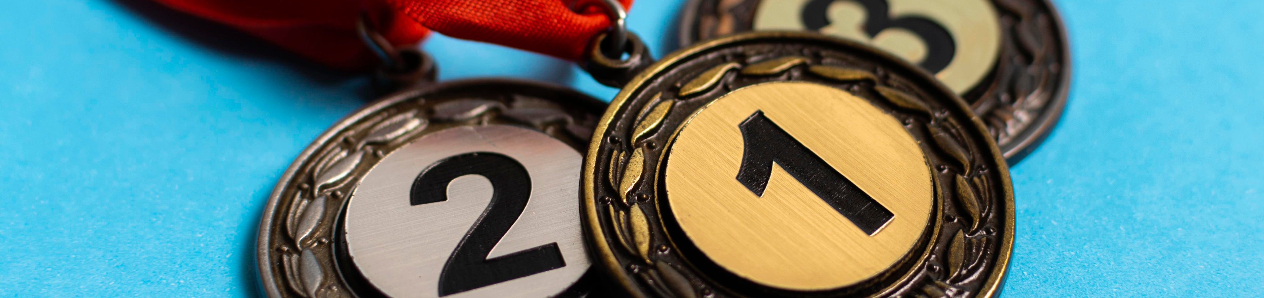 Medals vs Trophies