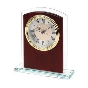 Glass, wood, and brass table clock